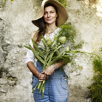Joanna holding Artichokes